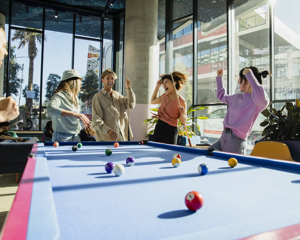 People playing pool