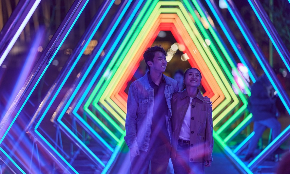 couple photographed at vivid sydney in the tunnels 2023